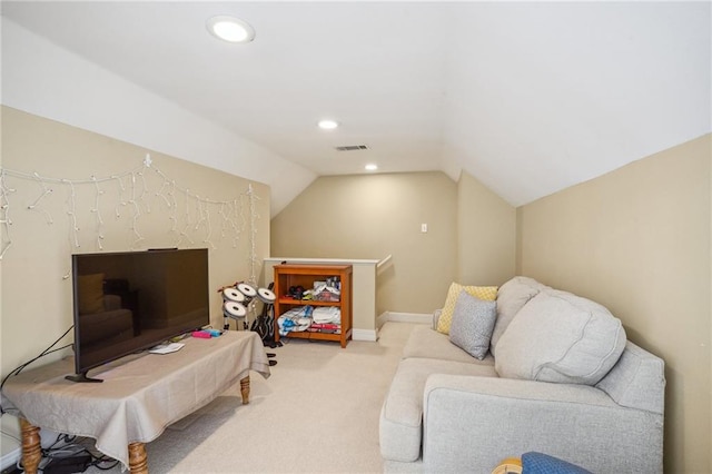 living room featuring light carpet and lofted ceiling