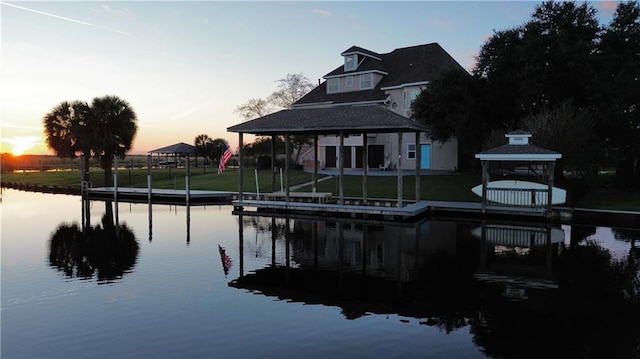 dock area featuring a water view and a gazebo