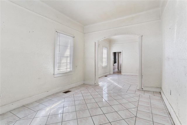 empty room featuring light tile patterned flooring