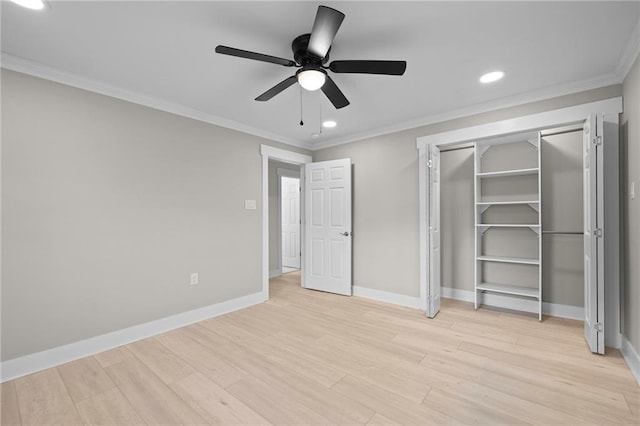 unfurnished bedroom with ornamental molding, a closet, light hardwood / wood-style floors, and ceiling fan