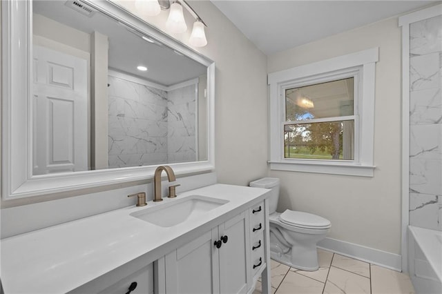 full bathroom featuring vanity, toilet, and tiled shower / bath