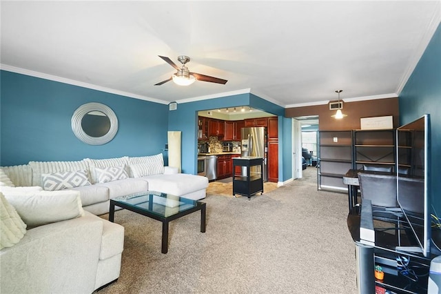 living room featuring light carpet, ceiling fan, and ornamental molding