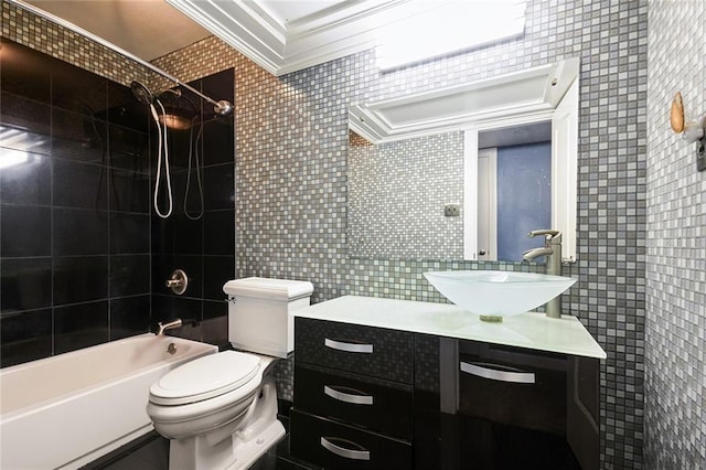 full bathroom with vanity, ornamental molding, tile walls, and tiled shower / bath