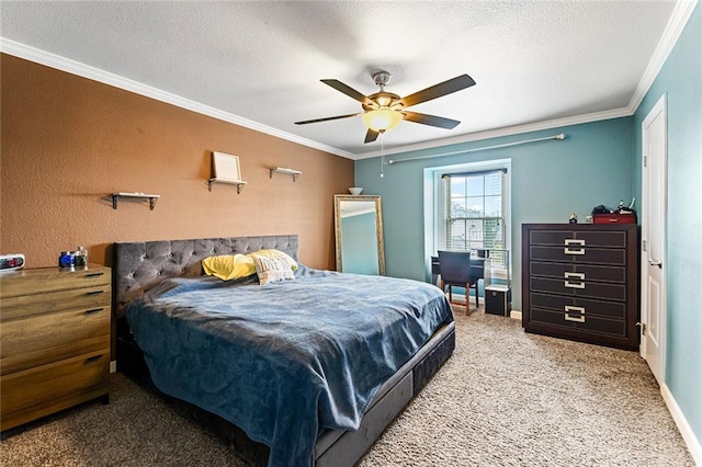 carpeted bedroom featuring a textured ceiling, ceiling fan, and ornamental molding