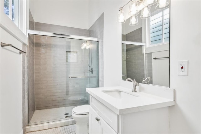 2927 Palmyra St, New Orleans, LA 70119 - full bathroom with toilet, plenty of natural light, vanity, and a stall shower