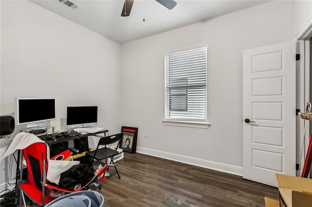 office area with dark wood-type flooring and ceiling fan