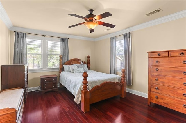 bedroom with dark hardwood / wood-style floors, ceiling fan, and ornamental molding