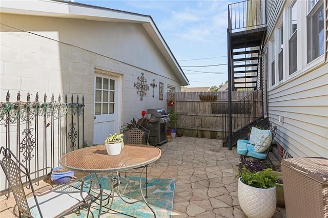 view of patio with a grill