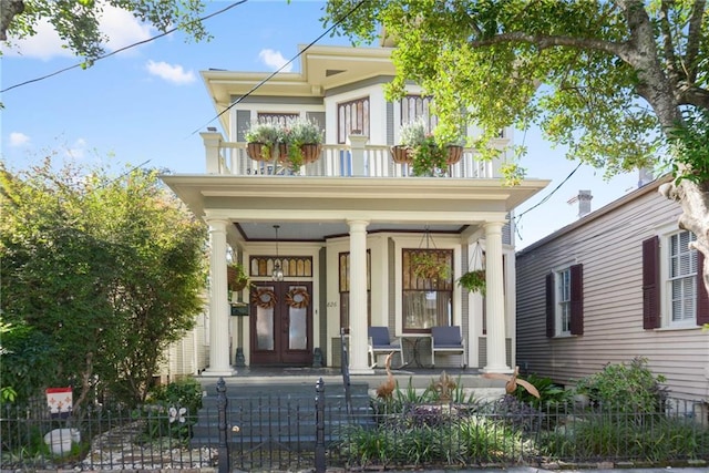 view of front facade with a porch and a balcony