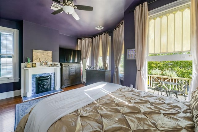 unfurnished bedroom featuring dark hardwood / wood-style floors and ceiling fan