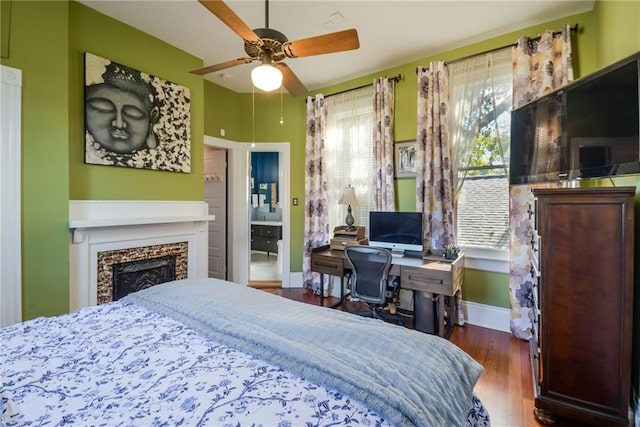 bedroom featuring hardwood / wood-style floors and ceiling fan