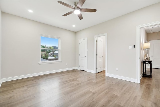 unfurnished bedroom featuring ceiling fan and light wood-type flooring