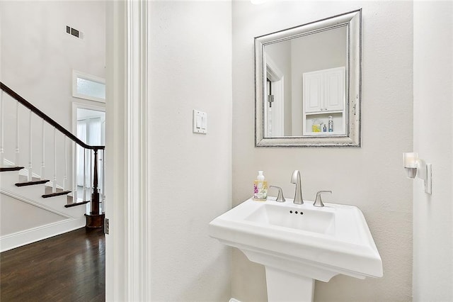 bathroom featuring hardwood / wood-style flooring and sink