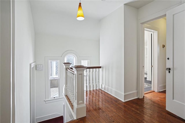 hall with dark wood-type flooring