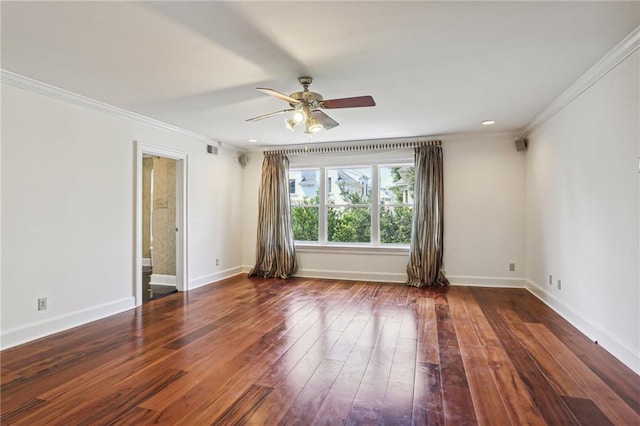 empty room featuring dark hardwood / wood-style floors, ceiling fan, and ornamental molding