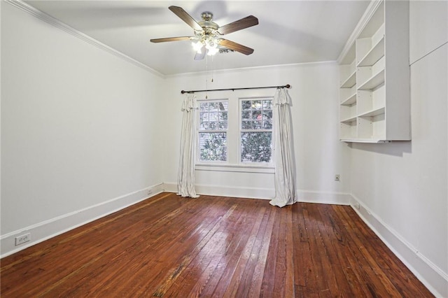 spare room with dark hardwood / wood-style floors, ceiling fan, and ornamental molding