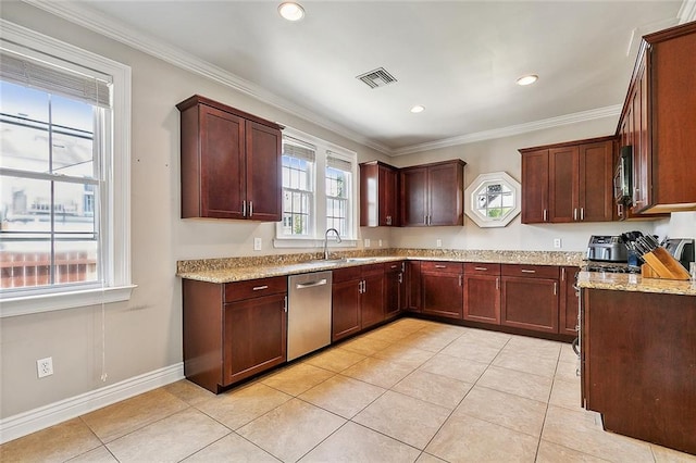 kitchen featuring sink, light stone counters, light tile patterned floors, and stainless steel appliances