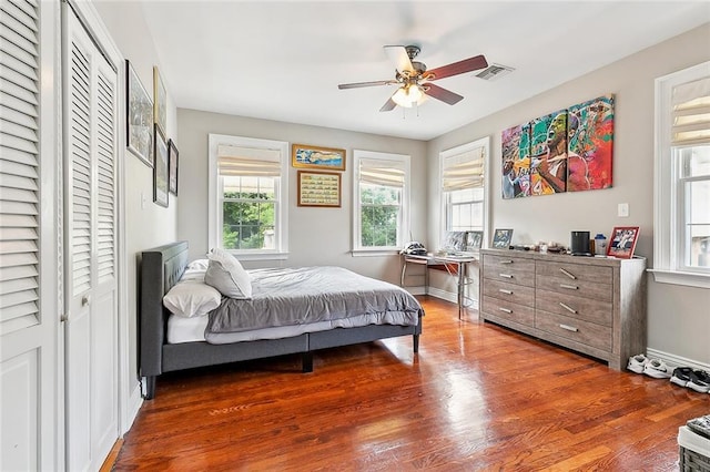 bedroom with hardwood / wood-style flooring and ceiling fan