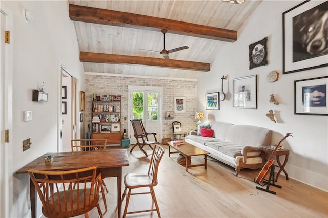 dining space with ceiling fan, light wood-type flooring, wood ceiling, and beam ceiling