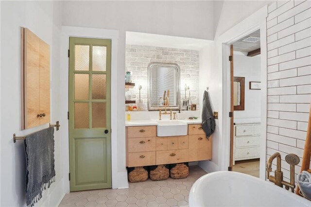 bedroom with light hardwood / wood-style flooring, beamed ceiling, a closet, wood ceiling, and ornamental molding