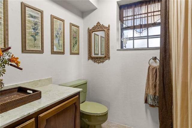 bathroom with vanity and tile patterned flooring