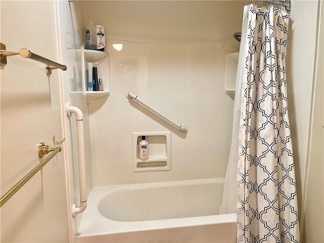 bathroom with shower / tub combo with curtain