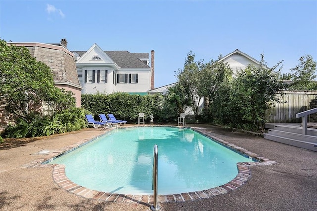 view of pool featuring a patio