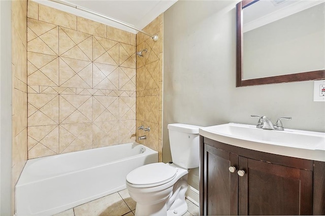 full bathroom featuring toilet, tiled shower / bath combo, vanity, and tile patterned flooring