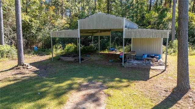 view of yard featuring a carport