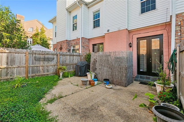 exterior space with a patio area and french doors