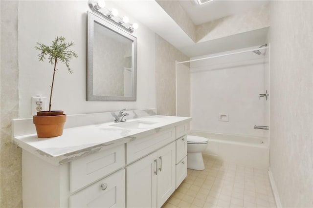 full bathroom featuring vanity, toilet, and  shower combination