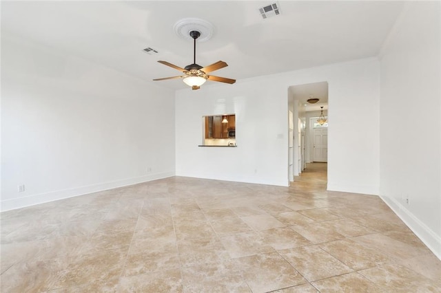 unfurnished living room with ceiling fan