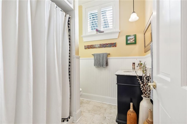 bathroom with vanity and toilet