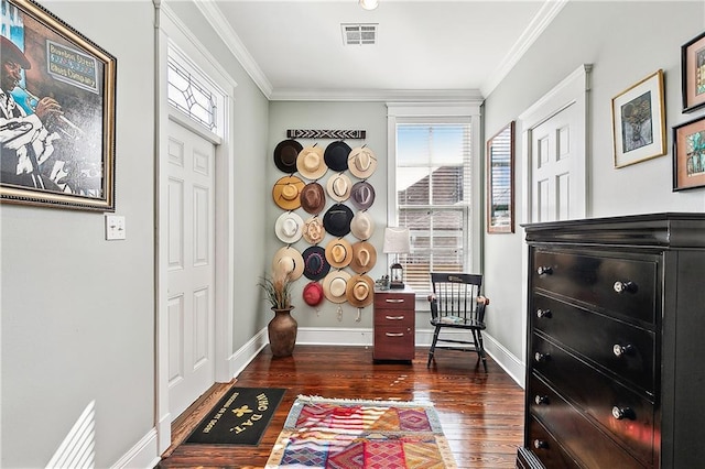 interior space with dark wood-type flooring and ornamental molding