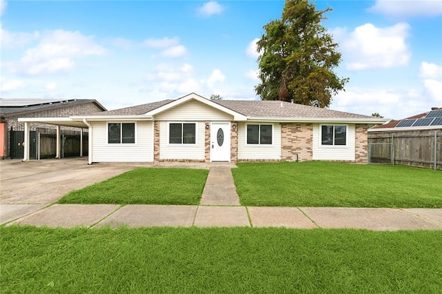 ranch-style home with a front lawn and a carport