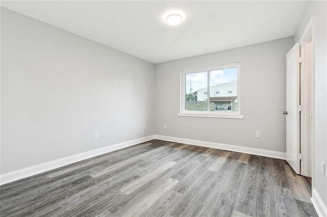 unfurnished bedroom featuring hardwood / wood-style flooring