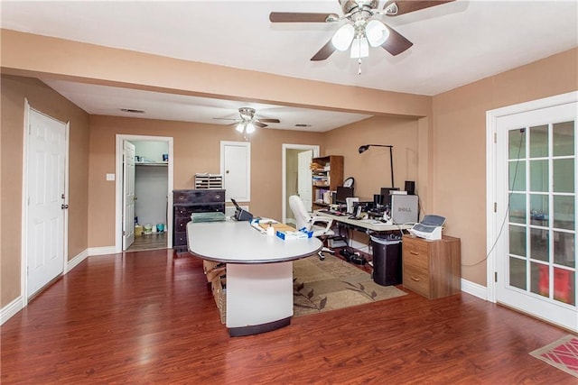 office with a ceiling fan, wood finished floors, and baseboards