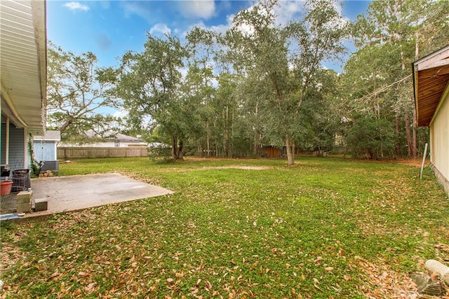 view of yard with a patio area