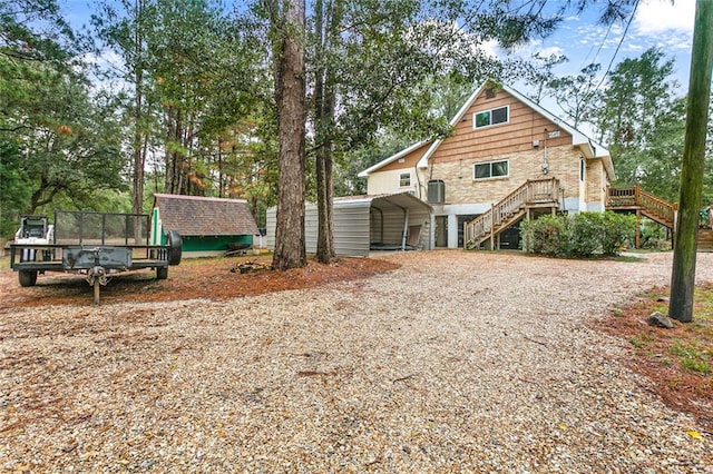 exterior space with a carport