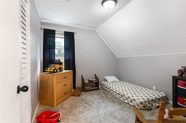 bedroom featuring carpet flooring and vaulted ceiling