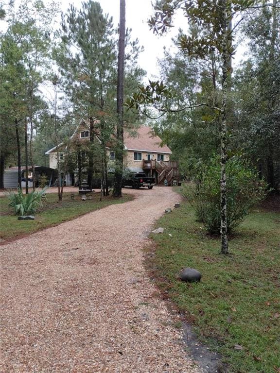 view of front of property featuring a wooden deck