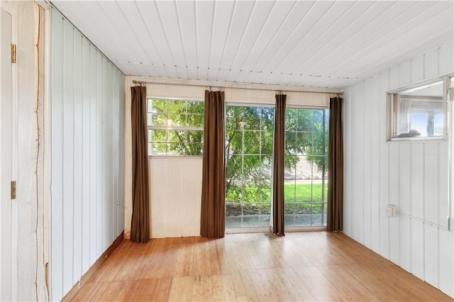 unfurnished living room featuring ceiling fan and ornamental molding