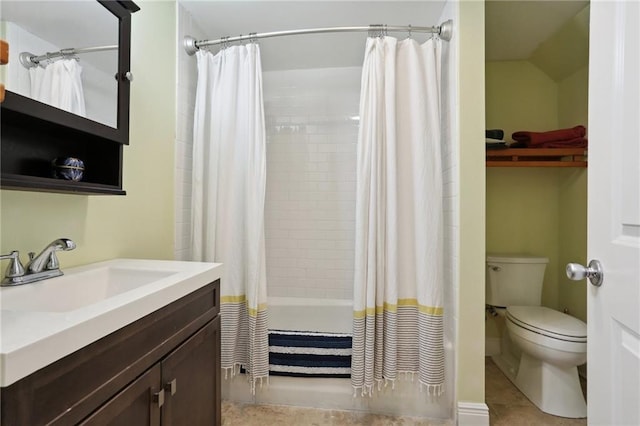 full bathroom with tile patterned floors, vanity, shower / bath combination with curtain, and toilet