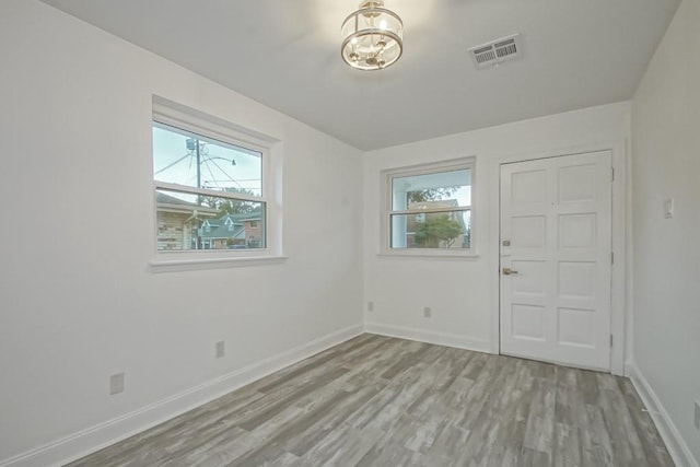 entrance foyer with light hardwood / wood-style floors