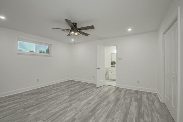 interior space featuring ceiling fan and light wood-type flooring