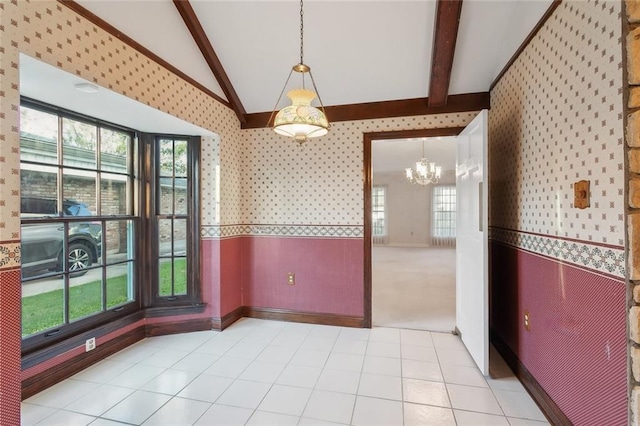 unfurnished dining area with an inviting chandelier, light tile patterned floors, and vaulted ceiling with beams