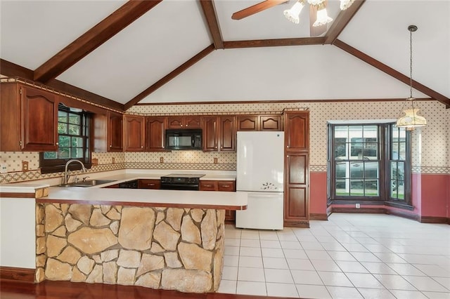 kitchen featuring kitchen peninsula, hanging light fixtures, black appliances, sink, and beam ceiling