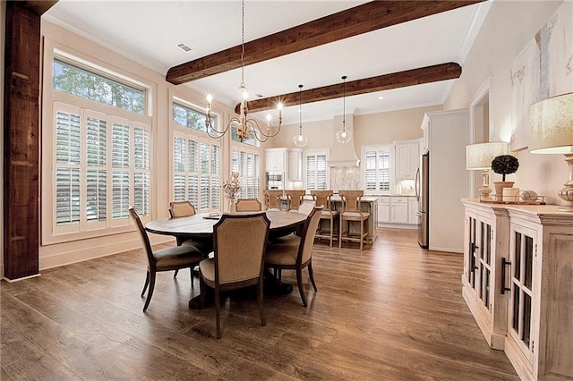 dining area featuring ornamental molding, beamed ceiling, a notable chandelier, and dark hardwood / wood-style flooring