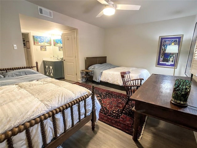 bedroom with hardwood / wood-style flooring and ceiling fan