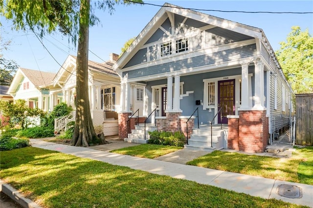 view of front of property with a front lawn